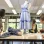 Two students creating new clothes from recycled materials.