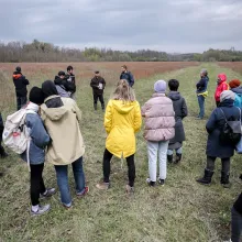Students and experts at the site