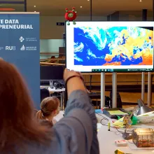students partake in a workshop to learn how to read satellite imagery