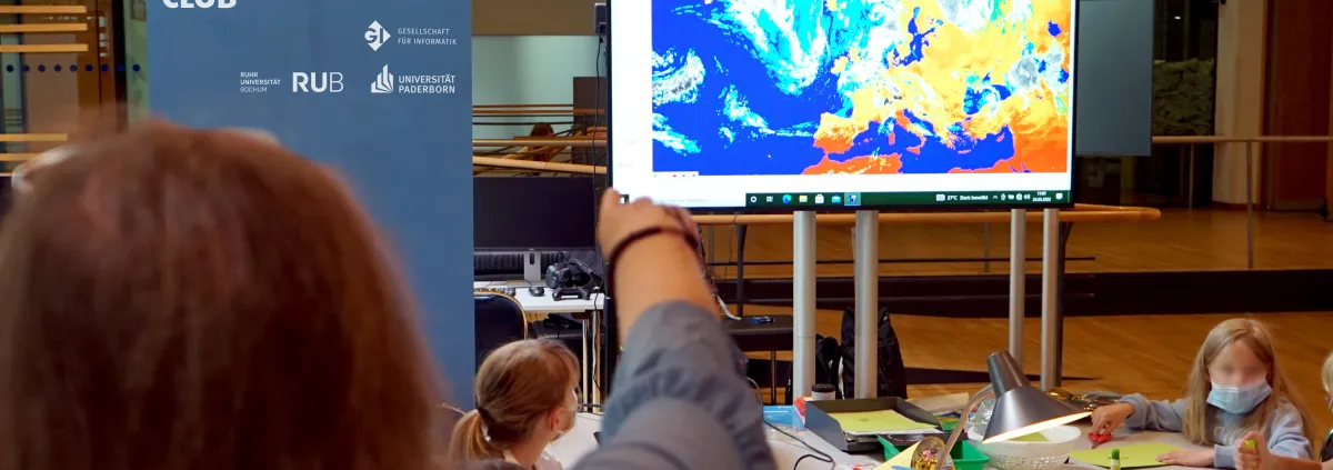 students partake in a workshop to learn how to read satellite imagery
